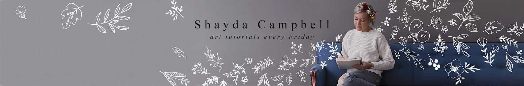 A gray background is covered in hand drawn flowers that appear to float from the sketchbook of the woman in the center